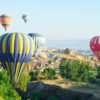 balloons flying over cappadocia