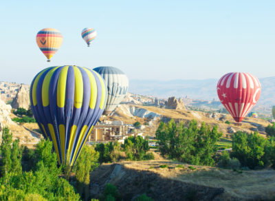 balloons flying over cappadocia